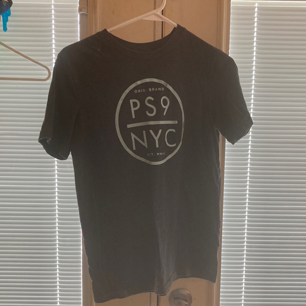 Save room in my closet. It’s a dark gray t-shirt with light blue design